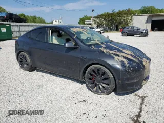 2024 Tesla Model Y Performance z VIN 7SAYGDEF1RF038664, wystawiony jako Copart lot #52583175 z przebiegiem Nie podano mil oraz Szkoda całkowita • Salvage title. Historia ofert i sprzedaży dostępna na DreamBid. Obrazek 4.