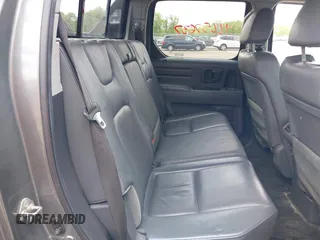 2007 Honda Ridgeline RTL z VIN 2HJYK16517H511157, wystawiony jako IAAI lot #42257637 z przebiegiem 266 894 mil mil oraz . Historia ofert i sprzedaży dostępna na DreamBid. Obrazek 8.