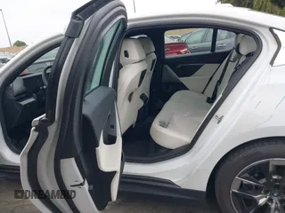 2024 BMW i5 eDrive40 with VIN WBY33FK03RCR99079, listed as a IAAI auction lot 42028540 with 28,827 mi miles and . Bid and sale history available at DreamBid. Image 8.