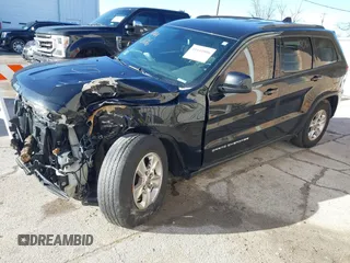 2016 Jeep Grand Cherokee Laredo z VIN 1C4RJFAG0GC425732, wystawiony jako IAAI lot #41641806 z przebiegiem 174 871 mil mil oraz . Historia ofert i sprzedaży dostępna na DreamBid. Obrazek 20.