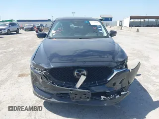 2018 Mazda CX-5 Grand Touring with VIN JM3KFADM8J0330035, listed as a IAAI auction lot 41878680 with 62,632 mi miles. Bid and sale history available at carsss.com. Image 13.