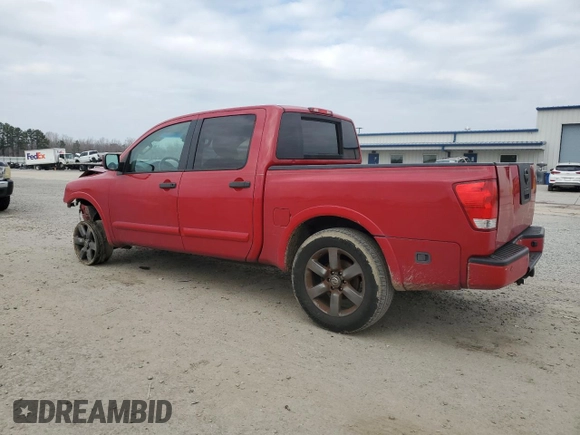 2012 Nissan Titan SV with VIN 1N6BA0EK4CN319941, listed as a Copart auction lot 43640705 with 210,885 mi miles and Salvage Title. Bid and sale history available at DreamBid. Image 2.