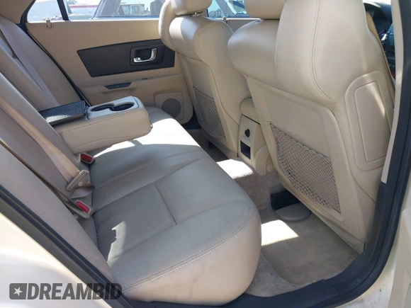 2004 Cadillac CTS with VIN 1G6DM577340132359, listed as a IAAI auction lot 42174306 with 165,844 mi miles. Bid and sale history available at carsss.com. Image 8.