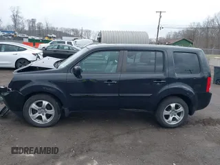 2012 Honda Pilot EX-L with VIN 5FNYF4H57CB068021, listed as a IAAI auction lot 41909996 with 253,542 mi miles and . Bid and sale history available at carsss.com. Image 14.