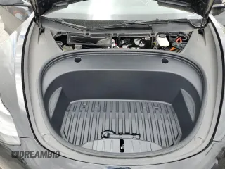 2023 Tesla Model 3 z VIN 5YJ3E1EA7PF600239, wystawiony jako Copart lot #56557705 z przebiegiem 18 851 mil mil oraz Szkoda całkowita • Salvage title. Historia ofert i sprzedaży dostępna na DreamBid. Obrazek 11.