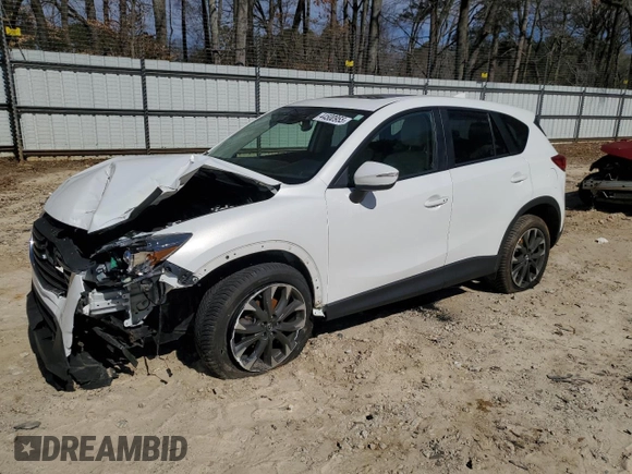 2016 Mazda CX-5 Grand Touring with VIN JM3KE4DY6G0857197, listed as a Copart auction lot 44500955 with 76,088 mi miles and Salvage Title. Bid and sale history available at DreamBid. Image 1.