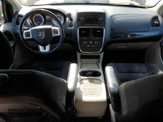 2014 Dodge Grand Caravan SXT z VIN 2C4RDGCG0ER321403, wystawiony jako Copart lot #55204635 z przebiegiem 219 510 mil mil oraz Tytuł czysty. Historia ofert i sprzedaży dostępna na DreamBid. Obrazek 8.