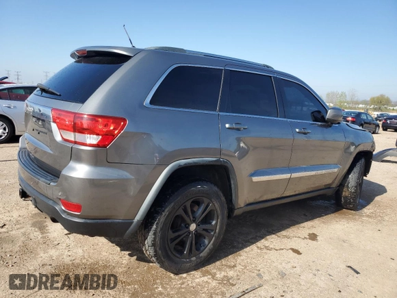 2011 Jeep Grand Cherokee Laredo with VIN 1J4RR4GGXBC642759, listed as a Copart auction lot 55767575 with 144,104 mi miles and Salvage title. Bid and sale history available at DreamBid. Image 3.