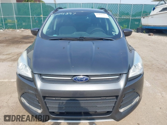 2016 Ford Escape SE z VIN 1FMCU0GX1GUC56439, wystawiony jako IAAI lot #42491397 z przebiegiem 158 785 mil mil oraz . Historia ofert i sprzedaży dostępna na DreamBid. Obrazek 6.
