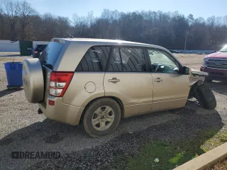 2007 Suzuki Grand Vitara z VIN JS3TE941X74201723, wystawiony jako Copart lot #46651695 z przebiegiem 282 768 mil mil oraz Szkoda całkowita • Salvage title. Historia ofert i sprzedaży dostępna na DreamBid. Obrazek 3.