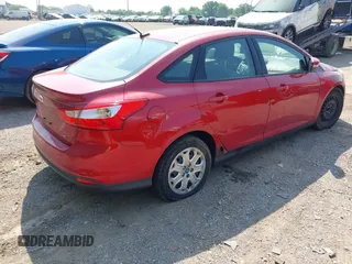 2012 Ford Focus SE with VIN 1FAHP3F24CL102709, listed as a IAAI auction lot 42491457 with 206,229 mi miles and . Bid and sale history available at DreamBid. Image 4.