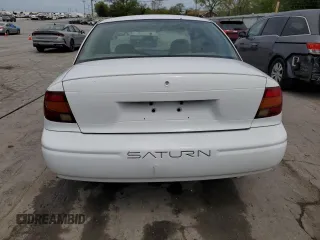 2002 Saturn SL z VIN 1G8ZH52842Z136222, wystawiony jako Copart lot #53687125 z przebiegiem 133 327 mil mil oraz Szkoda całkowita • Salvage title. Historia ofert i sprzedaży dostępna na DreamBid. Obrazek 6.