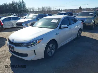 2017 Kia Optima with VIN KNAGT4LE9H5012924, listed as a IAAI auction lot 41682280 with 104,820 mi miles and . Bid and sale history available at DreamBid. Image 2.