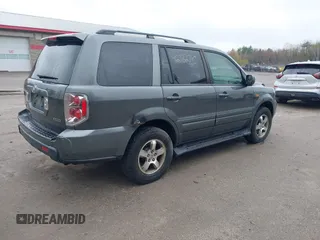 2007 Honda Pilot EX-L with VIN 2HKYF18667H526601, listed as a IAAI auction lot 42182710 with 221,948 mi miles and . Bid and sale history available at carsss.com. Image 4.