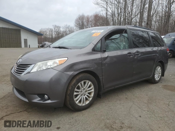 2014 Toyota Sienna XLE with VIN 5TDYK3DC1ES492724, listed as a Copart auction lot 51605245 with 112,079 mi miles and Salvage Title. Bid and sale history available at carsss.com. Image 1.