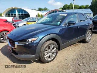 2020 Mazda CX-30 Preferred with VIN 3MVDMBDLXLM116005, listed as a Copart auction lot 64677635 with 55,141 mi miles and Salvage title. Bid and sale history available at DreamBid. Image 1.