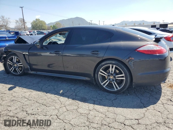 2013 Porsche Panamera с VIN WP0AA2A72DL014902, выставлен на аукционе Copart как лот 49202365 с пробегом 78 758 миль миль и Списание • Salvage title. История ставок и продаж доступна на DreamBid. Изображение 2.