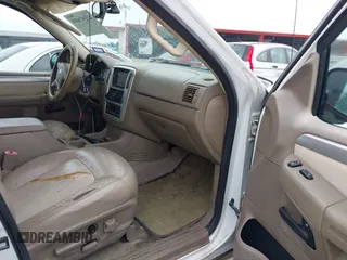 2004 Mercury Mountaineer Convenience z VIN 4M2ZU86K14ZJ19996, wystawiony jako IAAI lot #42297885 z przebiegiem 230 508 mil mil oraz . Historia ofert i sprzedaży dostępna na DreamBid. Obrazek 5.