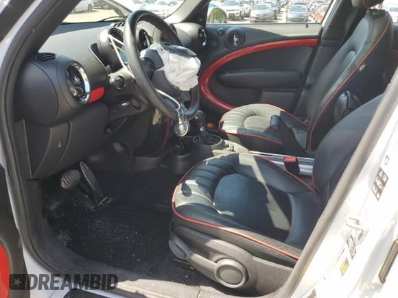 2015 MINI Countryman John Cooper Works with VIN WMWXD1C58FWS34860, listed as a Copart auction lot 55384065 with 48,709 mi miles and Salvage Title. Bid and sale history available at DreamBid. Image 7.