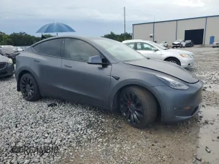 2022 Tesla Model Y Performance с VIN 7SAYGDEF0NF497582, выставлен на аукционе Copart как лот 65131685 с пробегом 50 948 миль миль и Чистый • Clean title. История ставок и продаж доступна на DreamBid. Изображение 4.