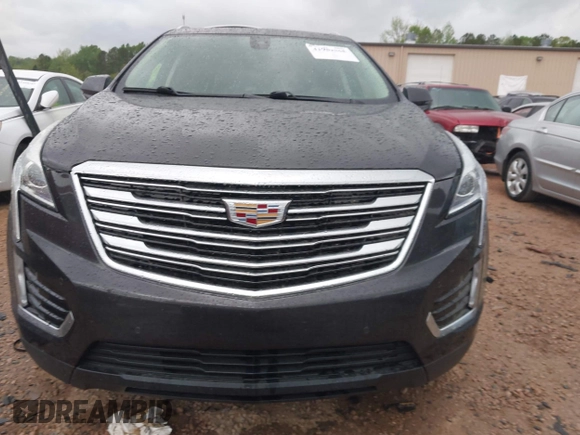 2019 Cadillac XT5 Luxury AWD z VIN 1GYKNDRS6KZ113420, wystawiony jako IAAI lot #41951065 z przebiegiem 56 360 mil mil oraz . Historia ofert i sprzedaży dostępna na DreamBid. Obrazek 12.