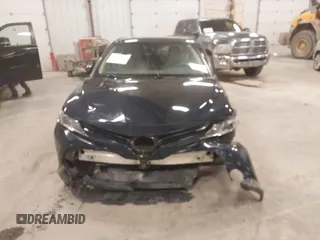 2020 Toyota Camry LE with VIN 4T1C11AK5LU926564, listed as a IAAI auction lot 41864812 with 104,212 mi miles and . Bid and sale history available at carsss.com. Image 6.