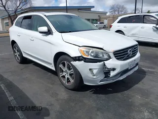2014 Volvo XC60 R-Design Premier Plus with VIN YV4902DZ5E2554526, listed as a IAAI auction lot 41764512 with 129,230 mi miles and . Bid and sale history available at DreamBid. Image 1.