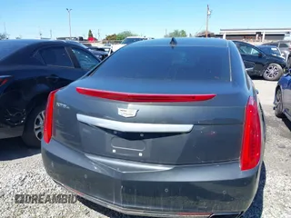 2016 Cadillac XTS Luxury Collection with VIN 2G61N5S32G9208717, listed as a IAAI auction lot 41197011 with 63,545 mi miles and . Bid and sale history available at carsss.com. Image 16.