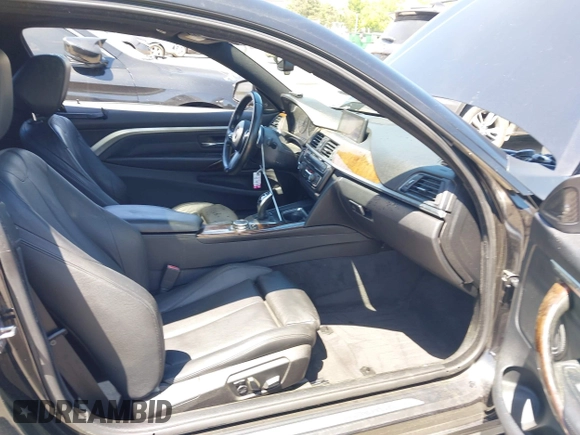 2015 BMW 4 Series 435i with VIN WBA3R1C56FK194060, listed as a IAAI auction lot 42061619 with 153,384 mi miles and . Bid and sale history available at DreamBid. Image 5.