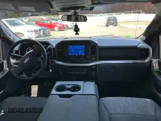 2023 Ford F-150 XL with VIN 1FTEW1EP1PFA41180, listed as a Copart auction lot 53303335 with 11,220 mi miles and Salvage Title. Bid and sale history available at carsss.com. Image 8.