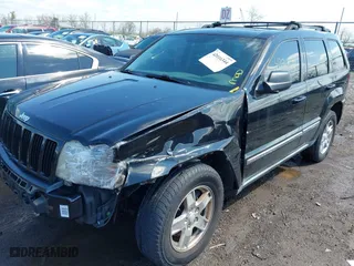 2007 Jeep Grand Cherokee Laredo with VIN 1J8GR48K57C519919, listed as a IAAI auction lot 42016344 with 190,132 mi miles. Bid and sale history available at carsss.com. Image 2.