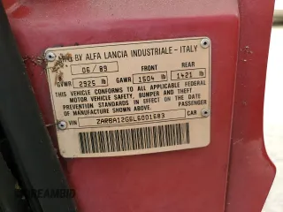 1990 Alfa Romeo Spider z VIN ZARBA12G6L6001683, wystawiony jako Copart lot #75611344 z przebiegiem 59 515 mil mil oraz Szkoda całkowita • Salvage title. Historia ofert i sprzedaży dostępna na DreamBid. Obrazek 13.