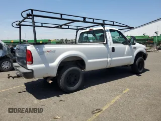 1999 Ford F-250 XL with VIN 1FTNF21L2XEE17853, listed as a Copart auction lot 58869285 with 140,220 mi miles and Clean title. Bid and sale history available at DreamBid. Image 3.