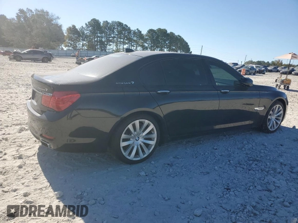 2011 BMW 7 Series with VIN WBAKX8C55BC198177, listed as a Copart auction lot 77016924 with 99,275 mi miles and Salvage title. Bid and sale history available at DreamBid. Image 3.