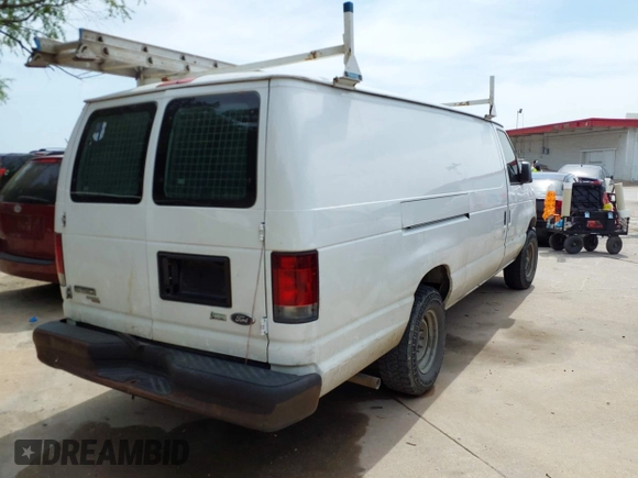 2011 Ford Econoline Cargo Commercial with VIN 1FTNS1EW0BDA65560, listed as a IAAI auction lot 42023428 with 267,279 mi miles. Bid and sale history available at carsss.com. Image 4.