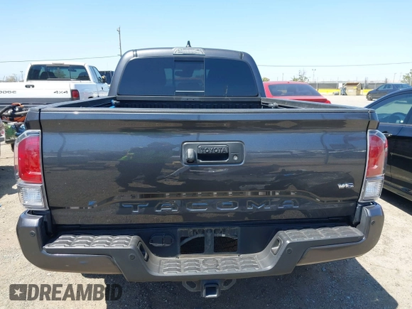 2023 Toyota Tacoma SR5 z VIN 3TMDZ5BN6PM153633, wystawiony jako IAAI lot #42353187 z przebiegiem 50 020 mil mil oraz . Historia ofert i sprzedaży dostępna na DreamBid. Obrazek 17.