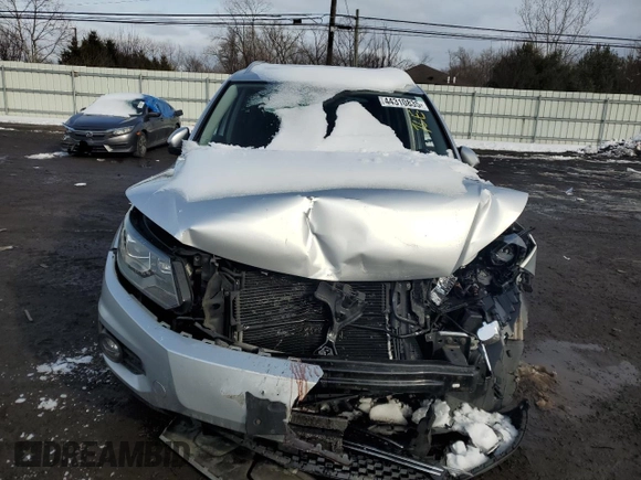 2016 Volkswagen Tiguan S with VIN WVGBV7AXXGW554423, listed as a Copart auction lot 44310835 with 123,118 mi miles and Salvage Title. Bid and sale history available at DreamBid. Image 5.
