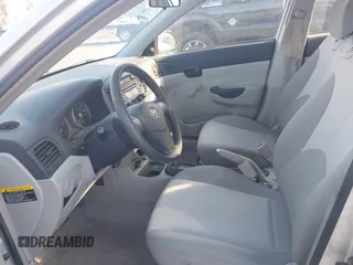 2006 Hyundai Accent GLS with VIN KMHCN46C86U007833, listed as a IAAI auction lot 41760603 with 60,030 mi miles. Bid and sale history available at carsss.com. Image 5.