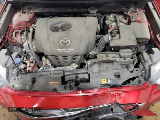 2017 Mazda CX-3 Grand Touring z VIN JM1DKFD70H0148182, wystawiony jako Copart lot #59032435 z przebiegiem 70 166 mil mil oraz Szkoda całkowita • Salvage title. Historia ofert i sprzedaży dostępna na DreamBid. Obrazek 12.