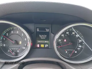 2012 Jeep Grand Cherokee Laredo with VIN 1C4RJFAG5CC224032, listed as a IAAI auction lot 42069334 with 106,614 mi miles. Bid and sale history available at carsss.com. Image 7.