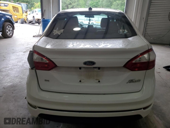2019 Ford Fiesta SE z VIN 3FADP4BJ6KM112222, wystawiony jako Copart lot #54720095 z przebiegiem 73 492 mil mil oraz Szkoda całkowita • Salvage title. Historia ofert i sprzedaży dostępna na DreamBid. Obrazek 6.