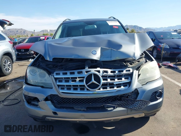 2010 Mercedes-Benz M 350 with VIN 4JGBB5GB0AA570448, listed as a IAAI auction lot 41911210 with 166,489 mi miles and . Bid and sale history available at DreamBid. Image 12.