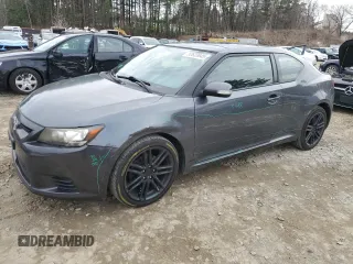 2012 Scion tC z VIN JTKJF5C75C3024945, wystawiony jako Copart lot #52623645 z przebiegiem 130 743 mil mil oraz Czysty tytuł • Clean title. Historia ofert i sprzedaży dostępna na DreamBid. Obrazek 1.