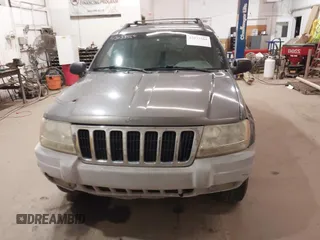 2000 Jeep Grand Cherokee Laredo z VIN 1J4GW48S1YC277710, wystawiony jako IAAI lot #42033564 z przebiegiem Nie podano mil oraz . Historia ofert i sprzedaży dostępna na DreamBid. Obrazek 12.
