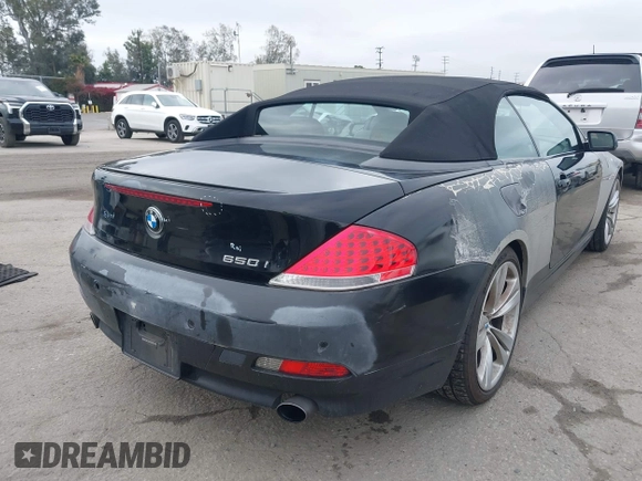 2007 BMW 6 Series 650i with VIN WBAEK13507CN81020, listed as a IAAI auction lot 42167743 with 127,552 mi miles. Bid and sale history available at carsss.com. Image 4.