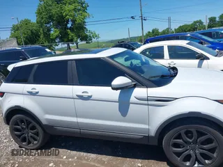 2015 Land Rover Range Rover Evoque Pure Premium z VIN SALVR2BG2FH075464, wystawiony jako IAAI lot #42268278 z przebiegiem 135 426 mil mil oraz . Historia ofert i sprzedaży dostępna na DreamBid. Obrazek 14.