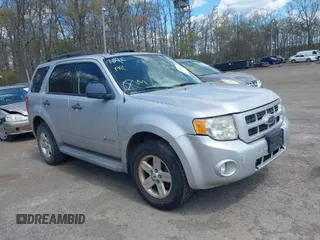 2009 Ford Escape Hybrid with VIN 1FMCU593X9KA36061, listed as a IAAI auction lot 42060150 with 183,184 mi miles. Bid and sale history available at carsss.com. Image 1.