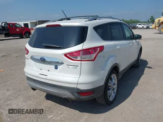 2015 Ford Escape Titanium with VIN 1FMCU0JX4FUB07322, listed as a IAAI auction lot 42220345 with 184,852 mi miles and . Bid and sale history available at DreamBid. Image 4.