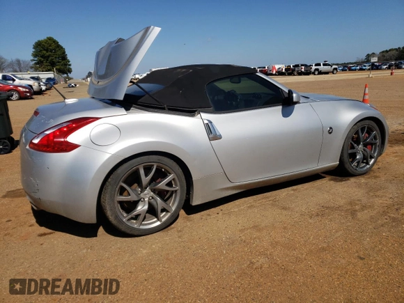 2014 Nissan 370Z Touring with VIN JN1AZ4FH4EM620612, listed as a Copart auction lot 47163375 with 148,458 mi miles and Clean Title. Bid and sale history available at DreamBid. Image 3.