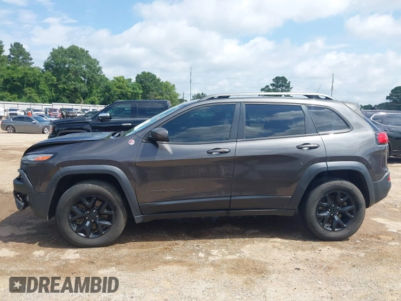 2014 Jeep Cherokee Trailhawk с VIN 1C4PJMBS6EW278648, выставлен на аукционе IAAI как лот 42433381 с пробегом 136 702 миль миль и . История ставок и продаж доступна на DreamBid. Изображение 14.